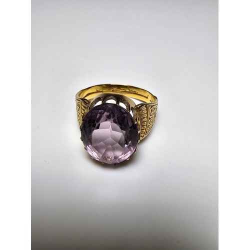 348 - Stunning antique 18ct yellow gold statement ring inset with a large natural faceted amethyst gemston... 