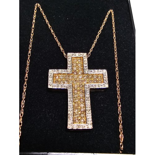 361 - Stunning 9ct yellow gold cross pendant encrusted with 70 diamonds 44 diamonds on the inside with yel... 