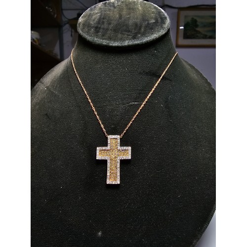 361 - Stunning 9ct yellow gold cross pendant encrusted with 70 diamonds 44 diamonds on the inside with yel... 