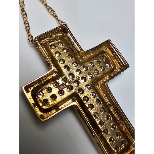 361 - Stunning 9ct yellow gold cross pendant encrusted with 70 diamonds 44 diamonds on the inside with yel... 