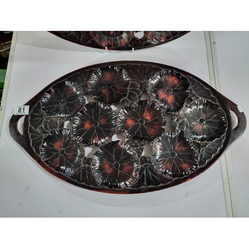 81 - 2x large oval rosewood Japanese drink serving trays with 9 inset floral cravings on each, both in go... 