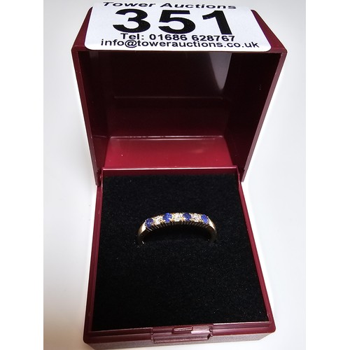 351 - A good quality hallmarked 18ct yellow gold 7 stone ring inset with 3 diamond stones and 4 sapphire s... 