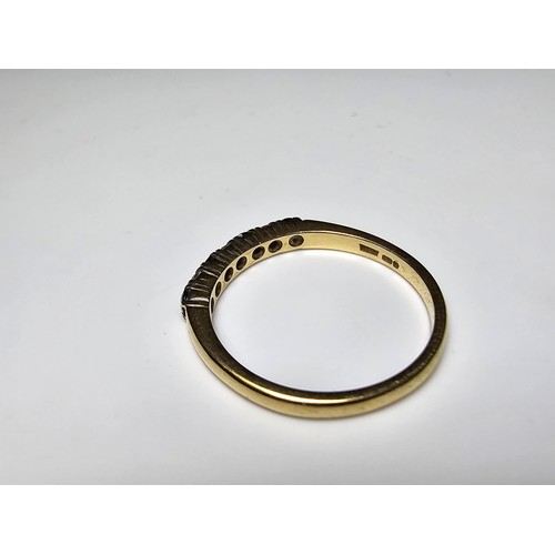 351 - A good quality hallmarked 18ct yellow gold 7 stone ring inset with 3 diamond stones and 4 sapphire s... 