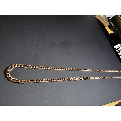 354 - A good quality hallmarked 9ct gold Italy neck chain with a Figaro link design, in excellent clean co... 