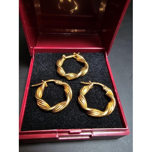 356 - A pair of hallmarked 9ct yellow gold earrings with a rope twist design along with 1 extra 9ct yellow... 