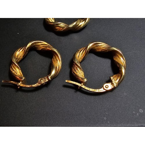 356 - A pair of hallmarked 9ct yellow gold earrings with a rope twist design along with 1 extra 9ct yellow... 