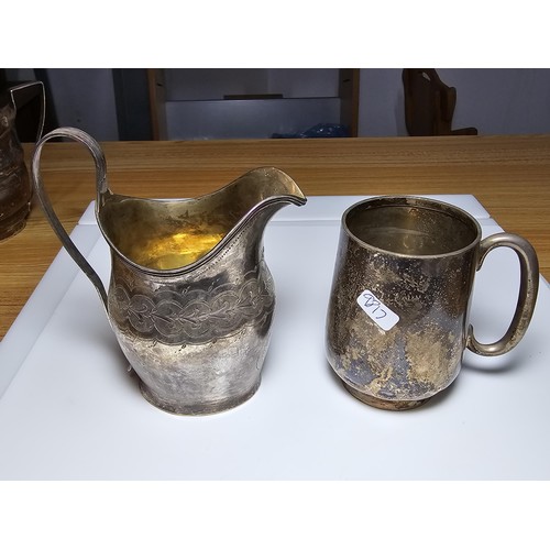 342 - 5 pieces of good antique hallmarked silver to include 2 jugs, a small tankard, a large twin handled ... 