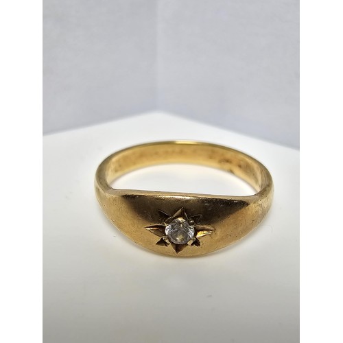 345 - A 9CT yellow gold ring inset with a sparkly single diamond which is .064ct in weight, appears unmark... 