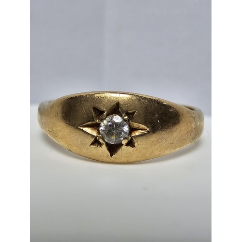 345 - A 9CT yellow gold ring inset with a sparkly single diamond which is .064ct in weight, appears unmark... 