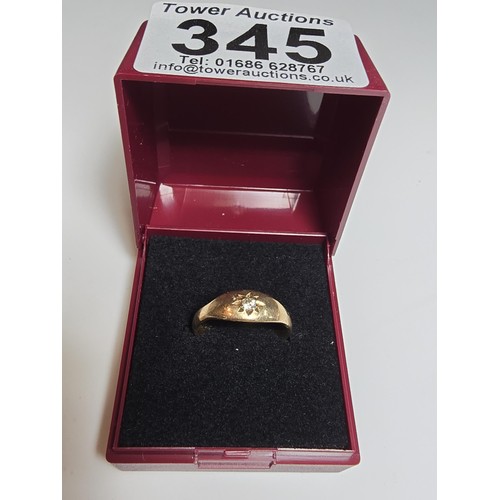 345 - A 9CT yellow gold ring inset with a sparkly single diamond which is .064ct in weight, appears unmark... 