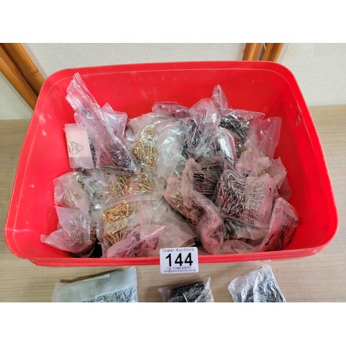 144 - Large tub containing a quantity of slate nails, screws, tacks, staples etc all in sealed bags