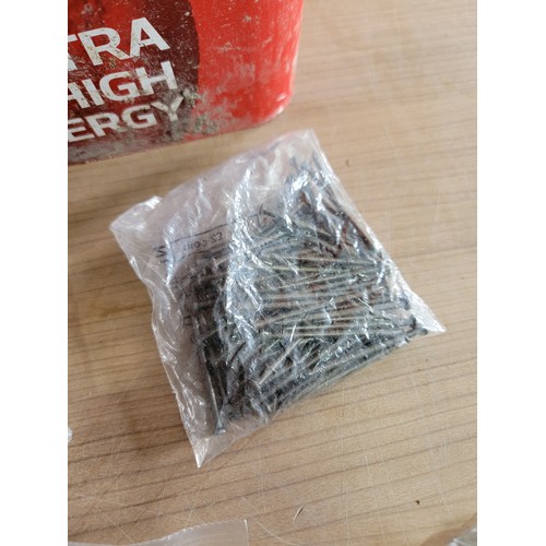 144 - Large tub containing a quantity of slate nails, screws, tacks, staples etc all in sealed bags