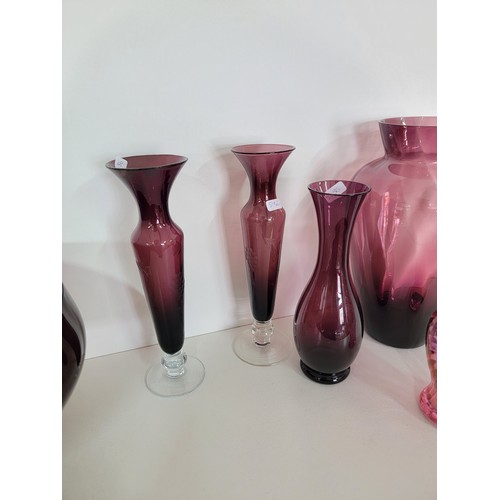 120 - Collection of 7x art glass pieces which includes amethyst glass vases, footed bowl, lidded amethyst ... 