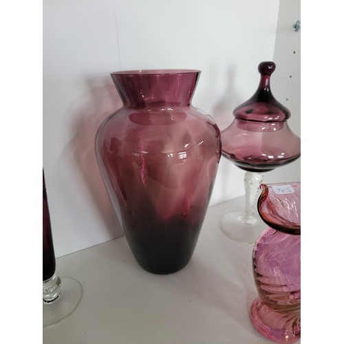 120 - Collection of 7x art glass pieces which includes amethyst glass vases, footed bowl, lidded amethyst ... 