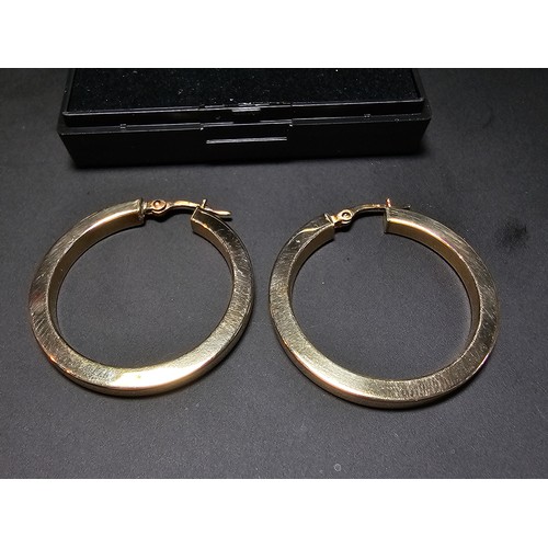 359 - A pair of large hallmarked yellow gold earrings in excellent clean condition. Total weight of 3.33g ... 