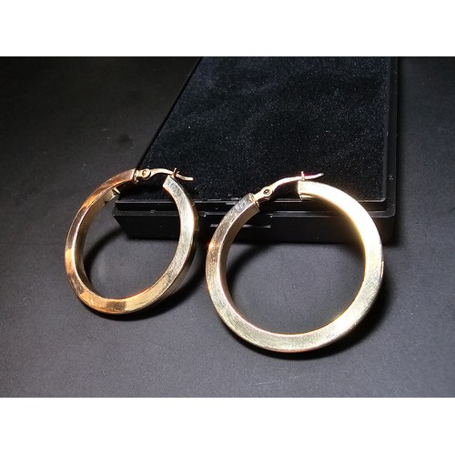 359 - A pair of large hallmarked yellow gold earrings in excellent clean condition. Total weight of 3.33g ... 