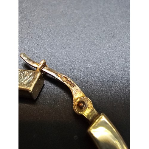 359 - A pair of large hallmarked yellow gold earrings in excellent clean condition. Total weight of 3.33g ... 