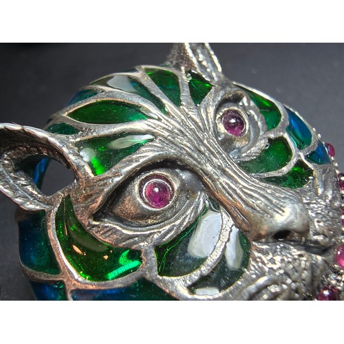 360 - A stunning 925 silver cat faced formed brooch with pretty blue and green stained glass backing, the ... 