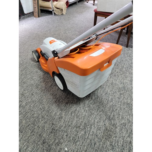 155 - Stihl electric lawn mower, RME 339, 1 year old, has a 37cm cutting width, 1200W, complete with grass... 