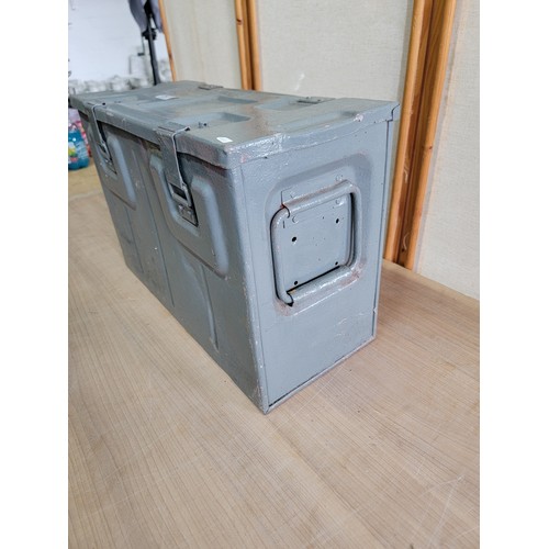 141 - A good quality grey metal 1940 ammunition box, stands at 34cm high, 49cm long and 22cm deep