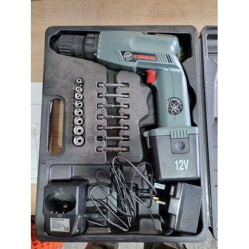 156 - 2x cased power tools, Hilka cordless drill/screwdriver 12 volt with accessories and battery charger ... 