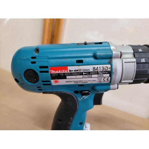 157 - A Makita 8413D 13mm 12V battery drill plus charger and 2 batteries (weak charge).