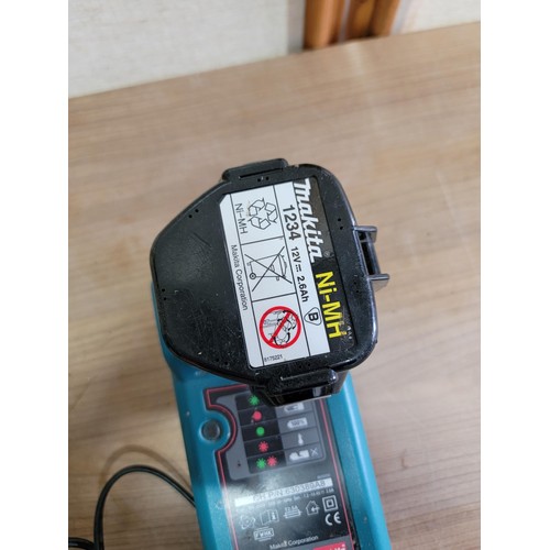 157 - A Makita 8413D 13mm 12V battery drill plus charger and 2 batteries (weak charge).