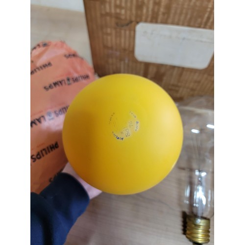 164 - Box containing 2 oversized light bulbs one by Cryselco 500w and a yellow bulb of similar size, both ... 