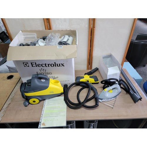 174 - Electrolux enviro multi steamer in box, with a large quantity of accessories and instructions in ful... 