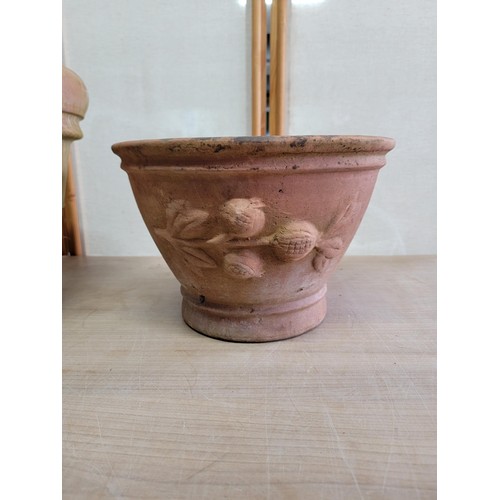 187 - 2x large good quality terracotta planters one with a poeny design to the side both in good order lar... 