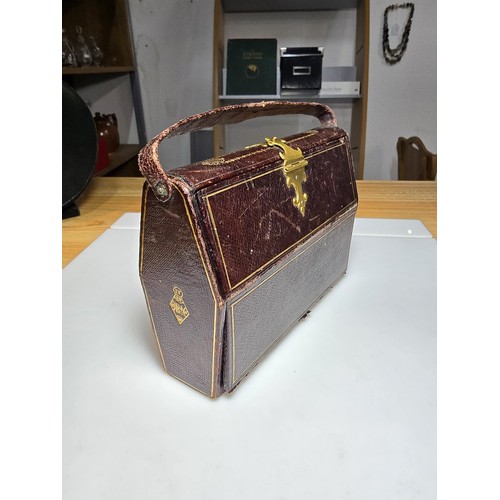 248 - A fine quality antique leather cased Etui  comprehensive sewing kit, appears complete which includes... 