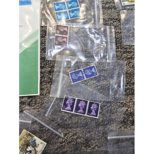 250 - A large collection of organized stamps in individual bags, some are mint stamp blocks covering many ... 