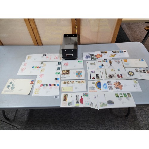 211 - Box containing a large quantity of first day covers inc British gardens, British fairs, St Johns Amb... 