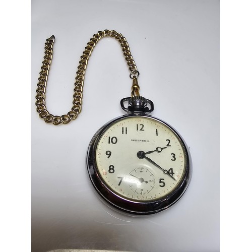 266 - A vintage chrome Ingersoll pocketwatch complete with chain and display box, has been tested for a sh... 