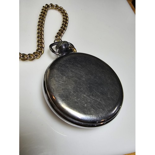 266 - A vintage chrome Ingersoll pocketwatch complete with chain and display box, has been tested for a sh... 