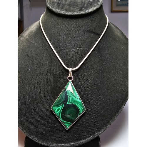 267 - A good quality 925 silver statement pendant inset with a large diamond shaped malachite stone presen... 