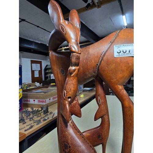 367 - Good quality large and impressive African solid wood carved figure group of a giraffe and its 2 youn... 