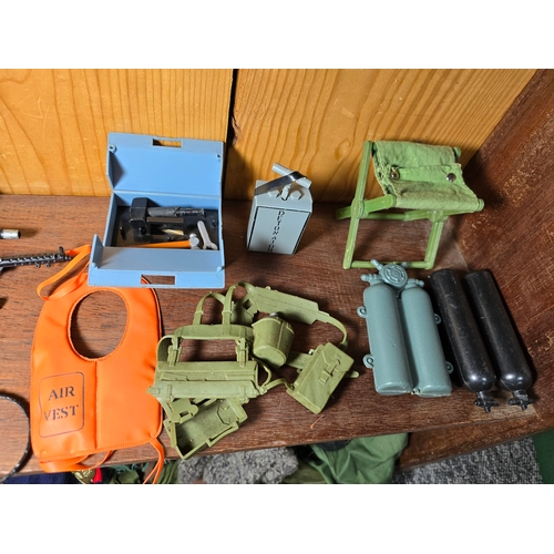 75 - A large comprehensive collection of early 1960's / 70's Action Man Accessories which includes aprox ... 