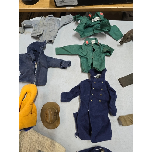 76 - A Large Comprehensive Collection of 1960's / 70's Action Man clothing and uniforms which includes ma... 