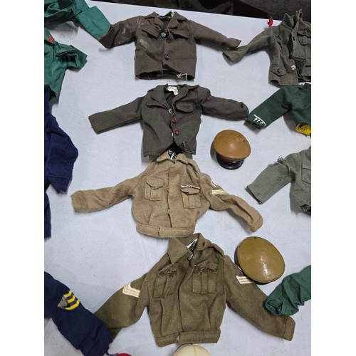 76 - A Large Comprehensive Collection of 1960's / 70's Action Man clothing and uniforms which includes ma... 