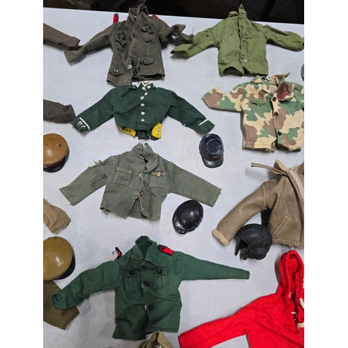 76 - A Large Comprehensive Collection of 1960's / 70's Action Man clothing and uniforms which includes ma... 