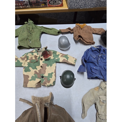 76 - A Large Comprehensive Collection of 1960's / 70's Action Man clothing and uniforms which includes ma... 