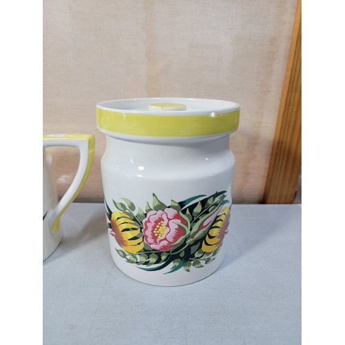 222 - We have a collection of 4x floral decorated Portmeirion kitchen pieces inc 2x storage pots with lids... 