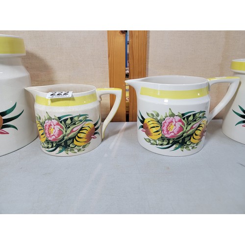 222 - We have a collection of 4x floral decorated Portmeirion kitchen pieces inc 2x storage pots with lids... 