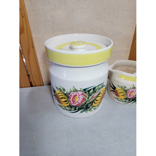 222 - We have a collection of 4x floral decorated Portmeirion kitchen pieces inc 2x storage pots with lids... 