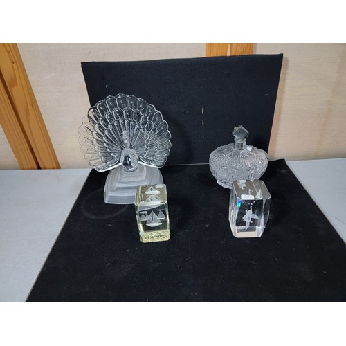 227 - 2x glass paper weights inc a fairy image and a boats image along with a glass peacock and a perfume ... 