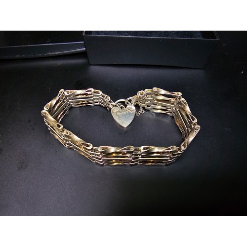 277 - A good hallmarked silver five bar gate bracelet complete with hallmarked silver padlock clasp. In ex... 