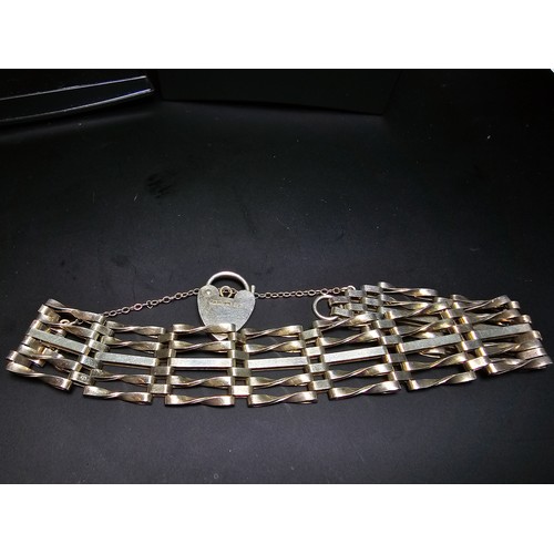 277 - A good hallmarked silver five bar gate bracelet complete with hallmarked silver padlock clasp. In ex... 