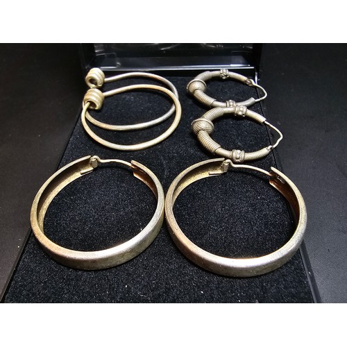 281 - A bundle of 3 pairs of 925 silver hoop earrings, all in good order complete with presentation box. T... 