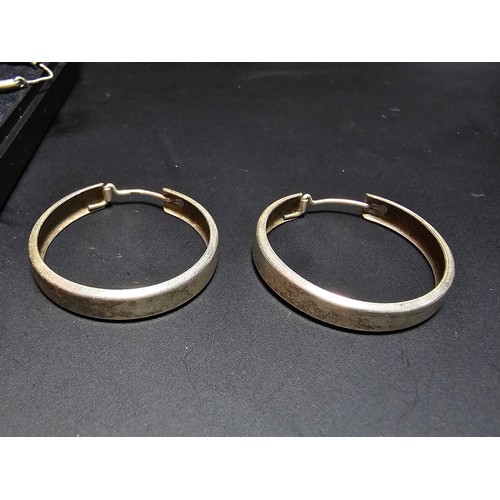 281 - A bundle of 3 pairs of 925 silver hoop earrings, all in good order complete with presentation box. T... 